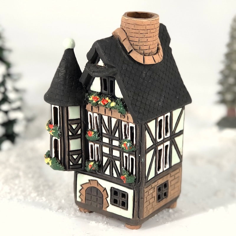 A521 half-timbered house with turrets