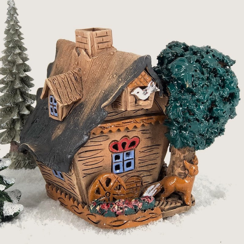 B510 Hunting lodge with tree
