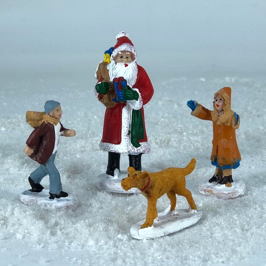 911730C Santa Claus with dog and Christmas figure