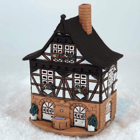 A002 Half-timbered house with well