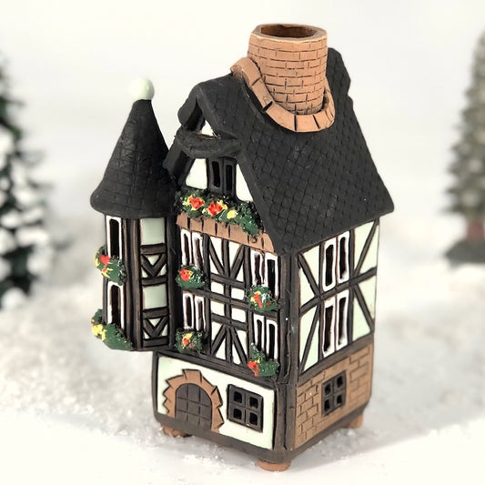 A521 half-timbered house with turrets