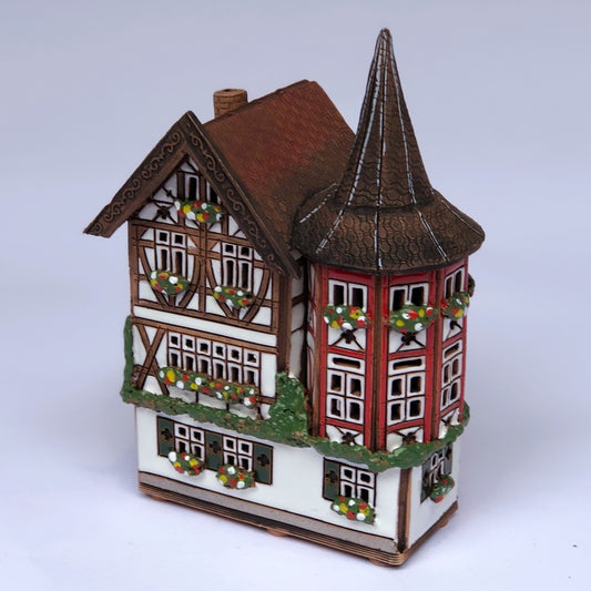 B140 half-timbered house with tower