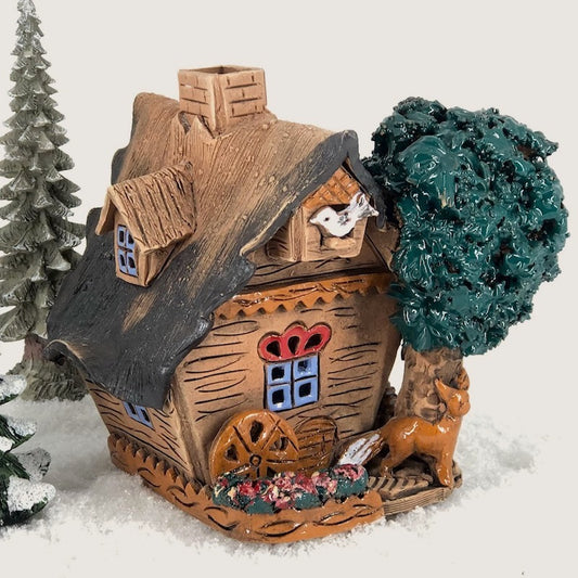 B510 Hunting lodge with tree